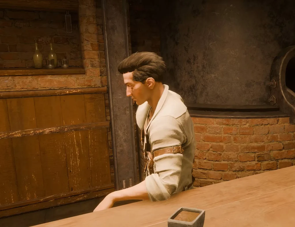 andrey stamatin leaning on a bar in pathologic 3